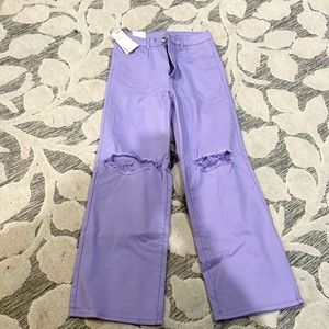 Brand new Purple stretch jean with distressed knees